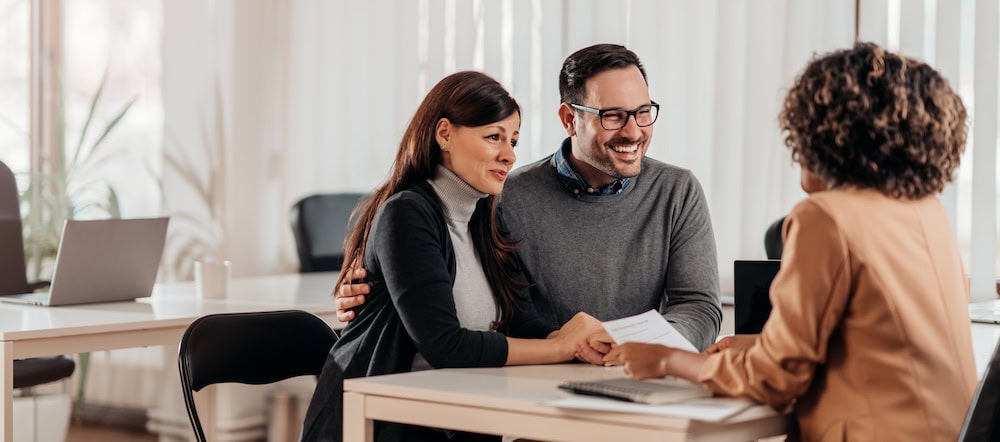 A couple meeting with a financial advisor